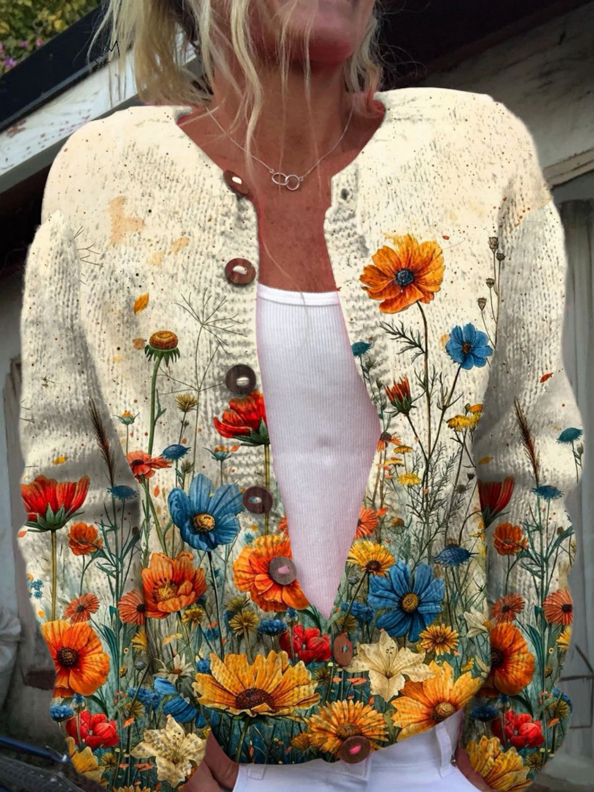 The Tansy cardigan draped over a chair